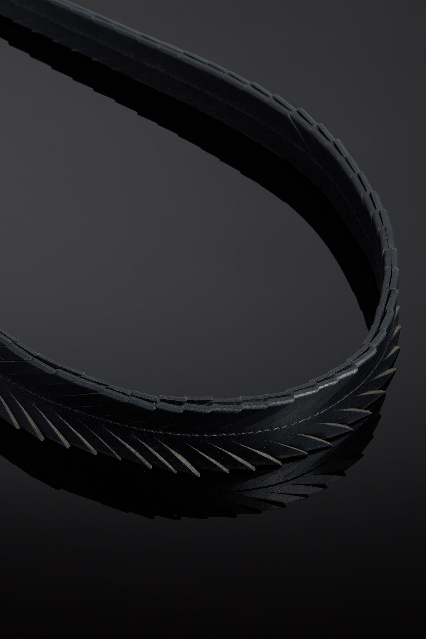 Pluma Feathered Leather Impact Tail