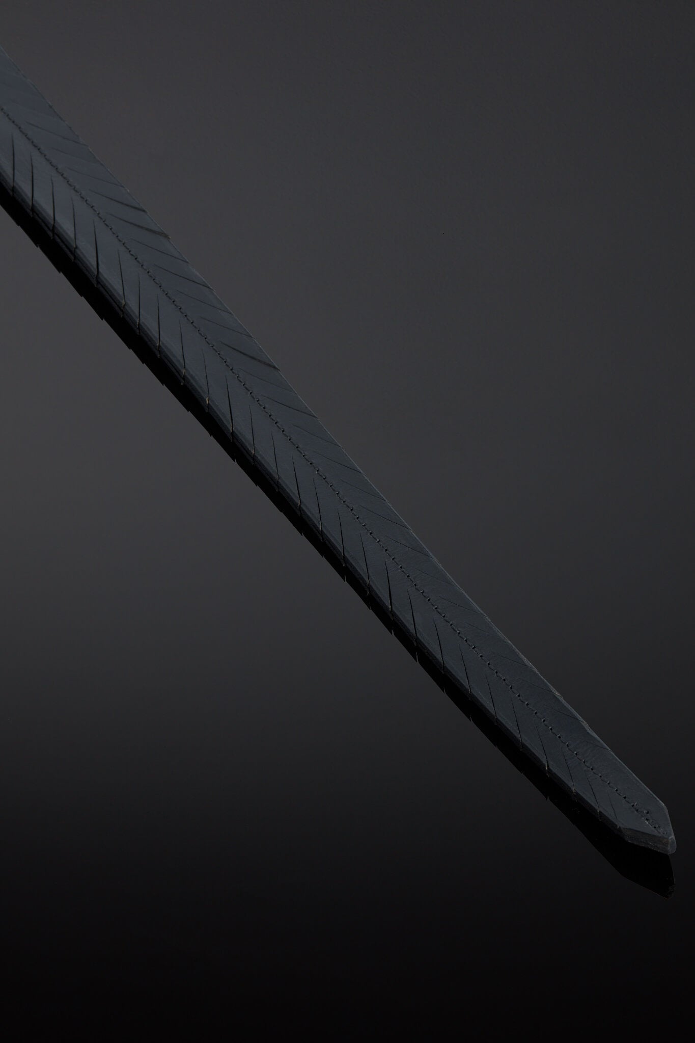 Pluma Feathered Leather Impact Tail