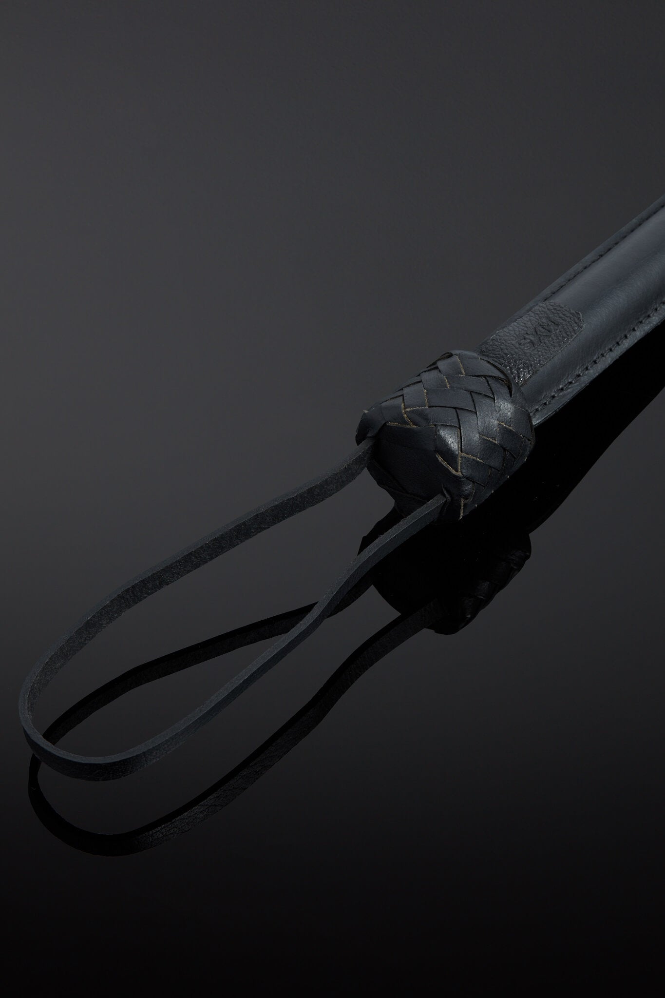 Pluma Feathered Leather Impact Tail