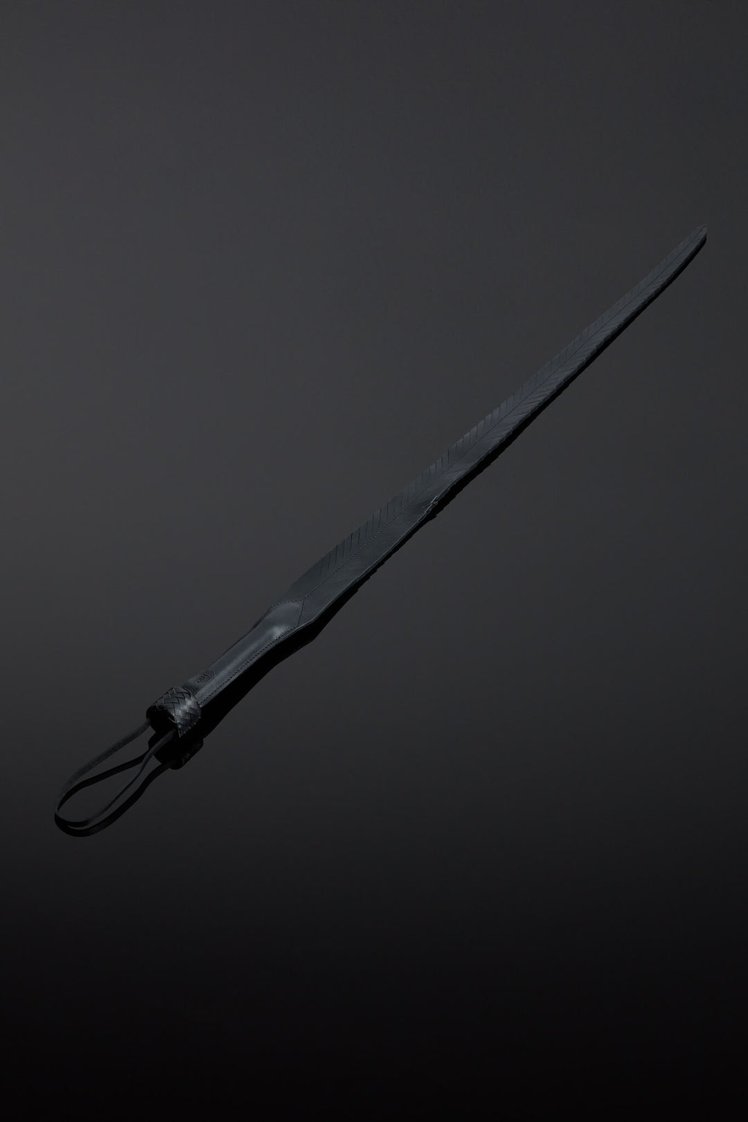 Pluma Feathered Leather Impact Tail