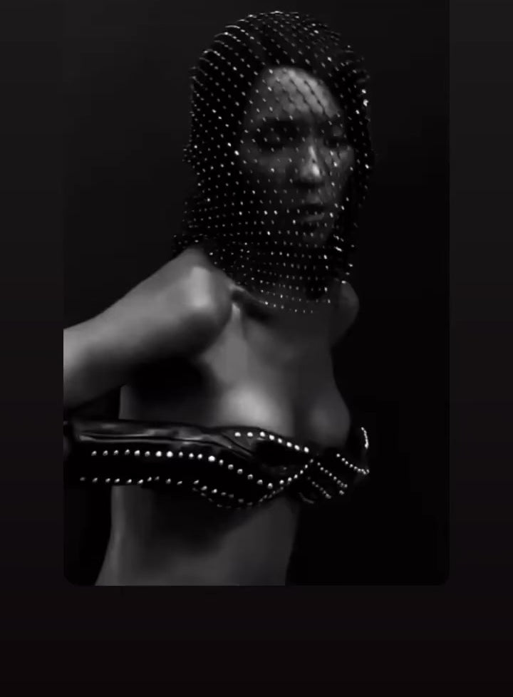 Model wearing the vellus hood and mask