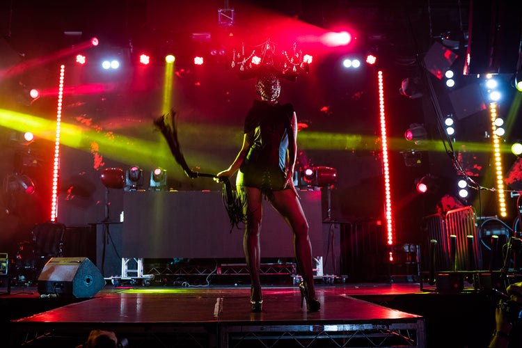 Model wearing a fashion runway ensemble at Torture Garden event