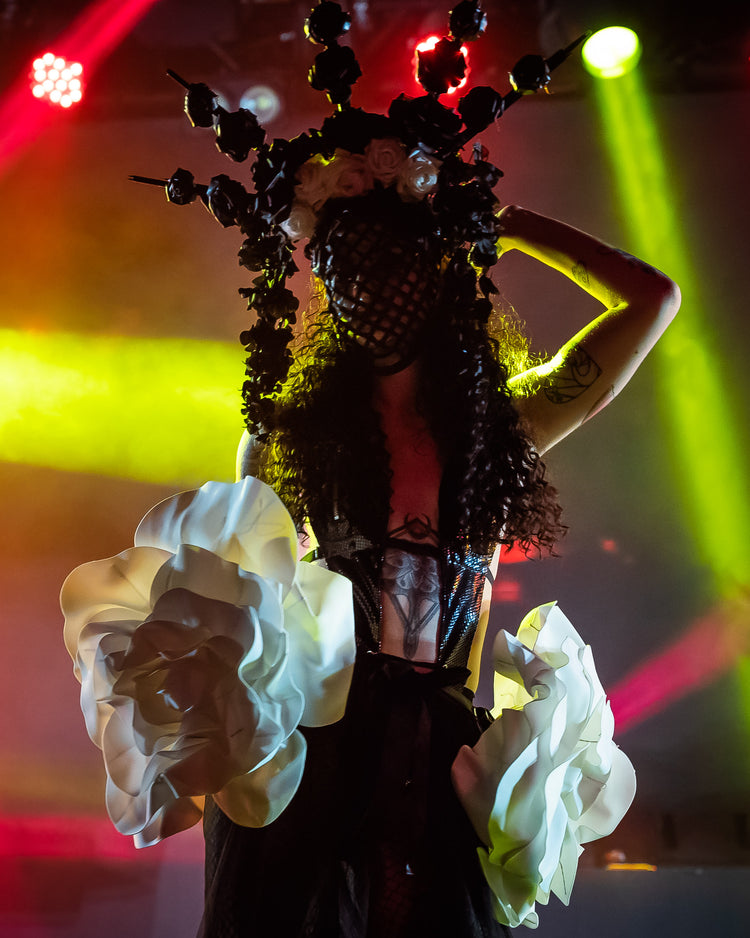 Model wearing the corsage fashion runway ensemble