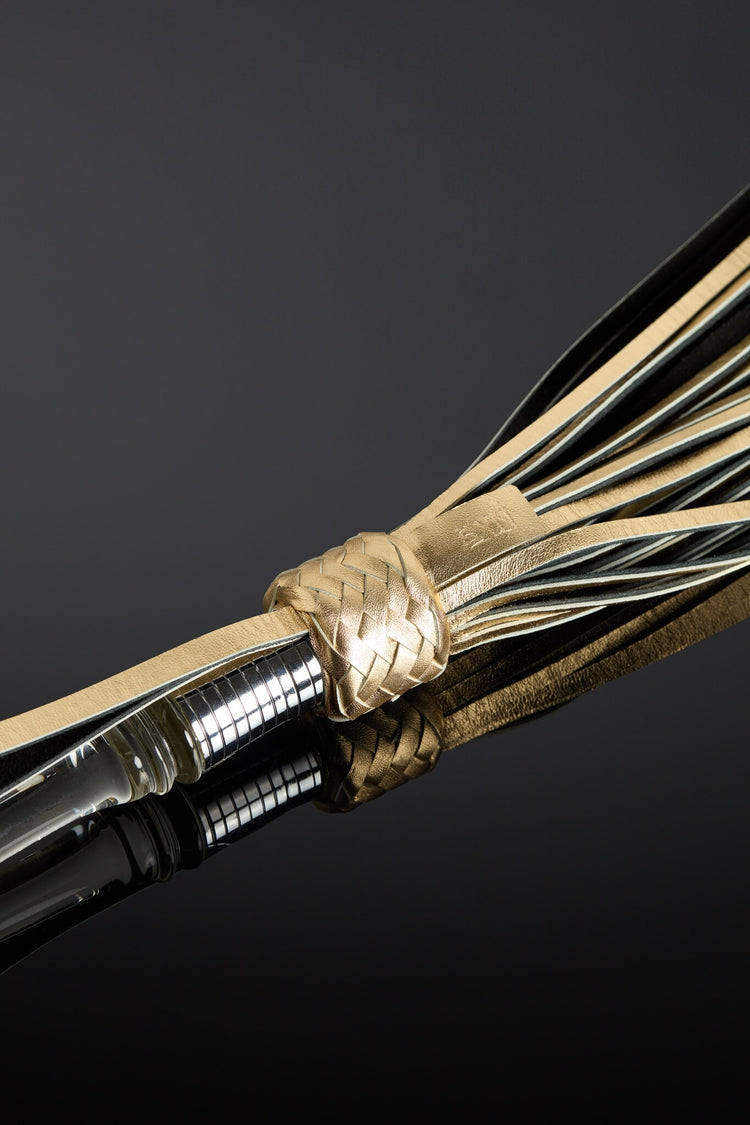 closeup of handle braiding that shows glass handle attaching to base