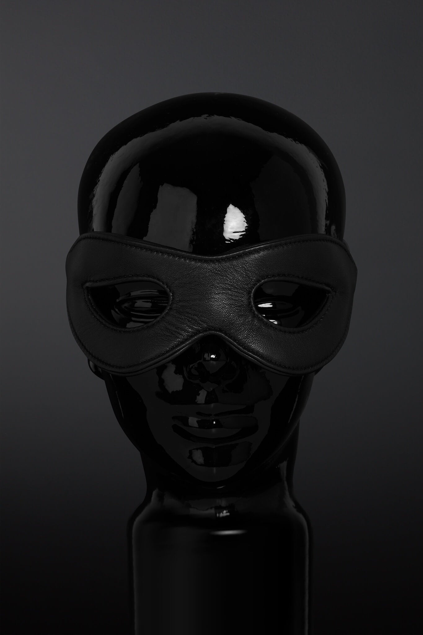 Black mask on a dark background