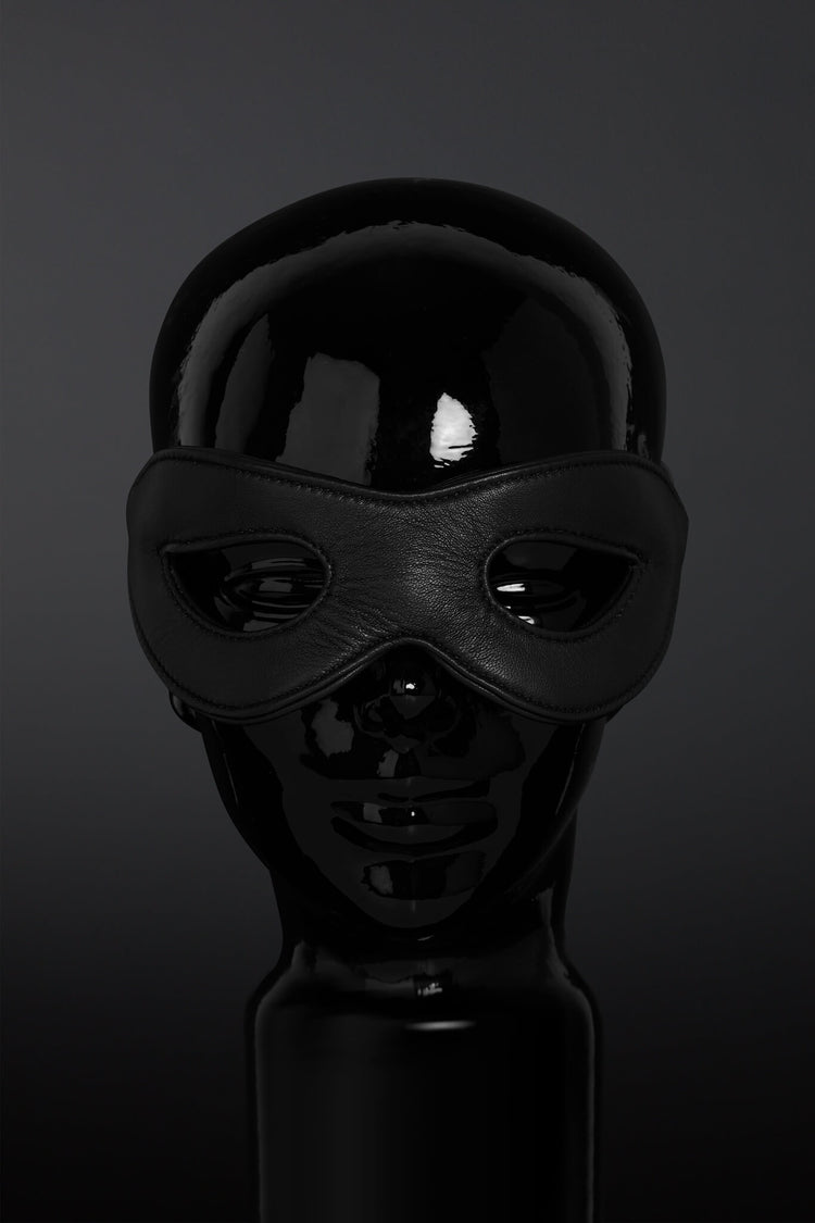 Black mask on a dark background