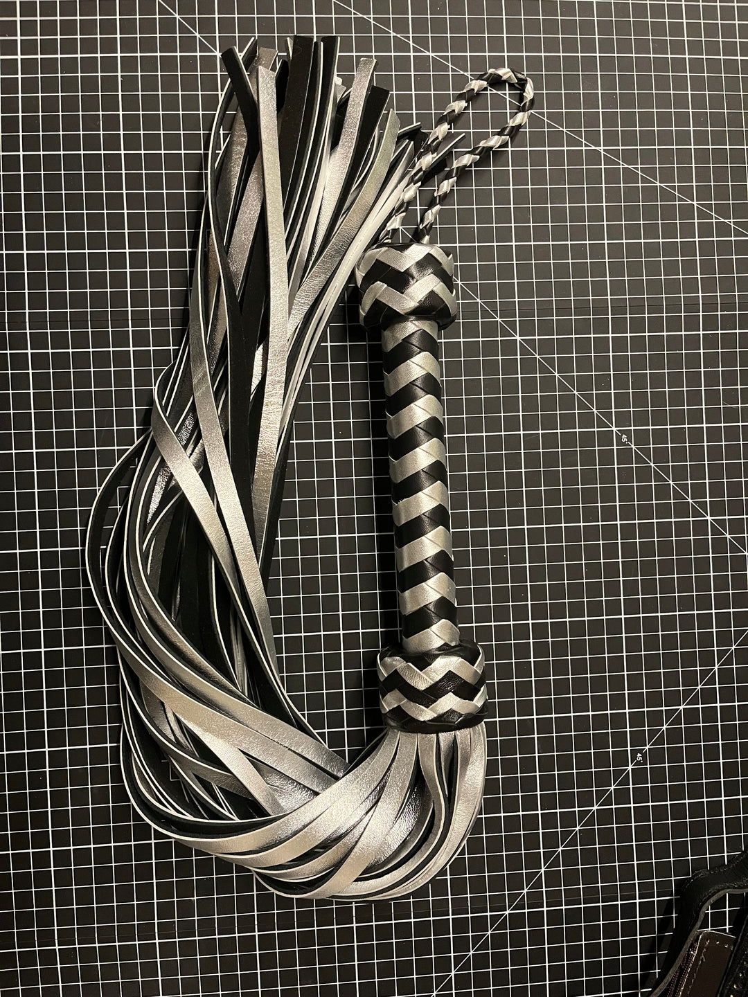 Silver and Black Leather Flogger - Sample Item