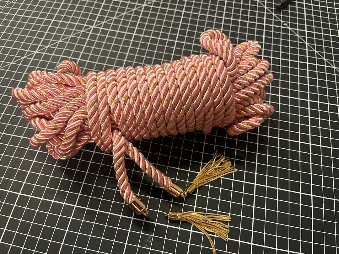 Pink color electro conductive rope, broken tassle.  - Sample